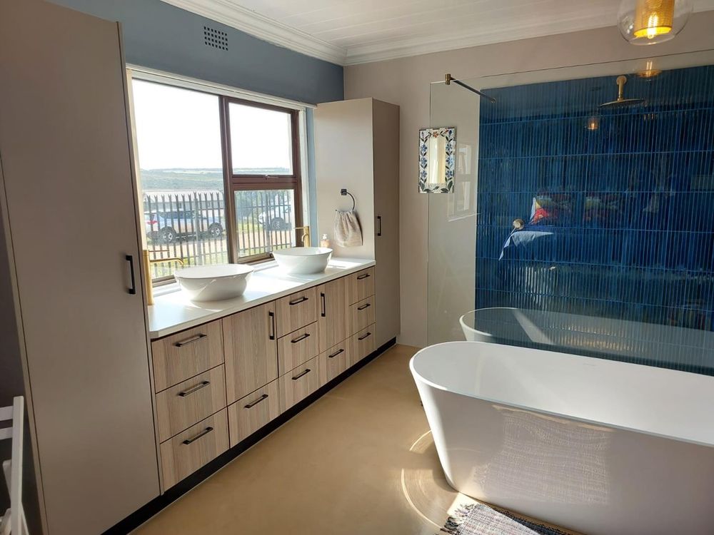 En suite main bathroom with bath and shower