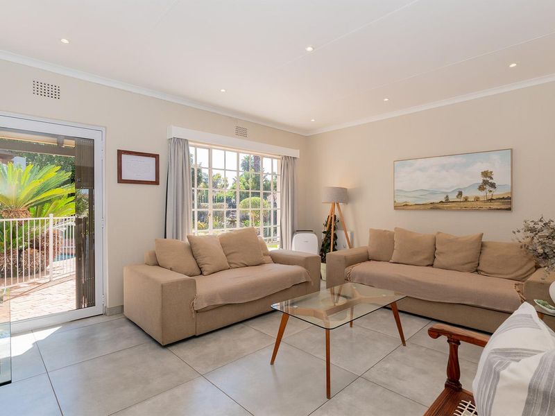 Stylish 4-Bedroom off-grid Family Home in Secure Van Riebeeck Park Enclosure - Photo 3