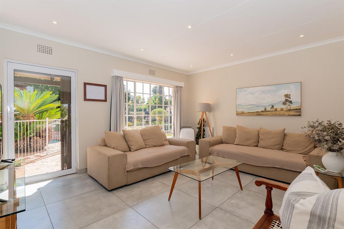 Stylish 4-Bedroom off-grid Family Home in Secure Van Riebeeck Park Enclosure - Photo 3