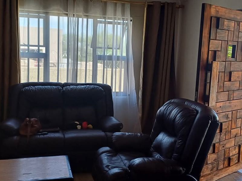 House is situated behind the Okahandja Mall. Additional to the main house is a 4 bedroom flat. - Photo 7