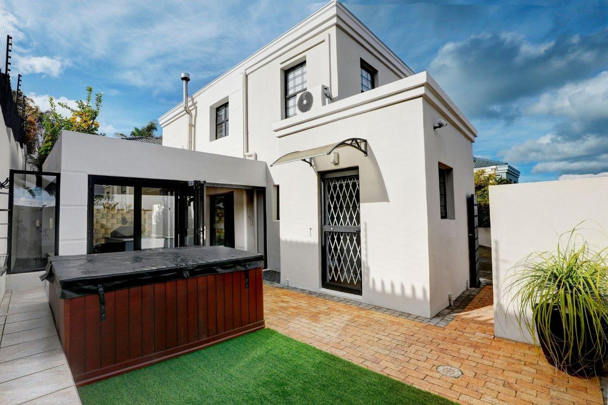 An exceptional opportunity to own a beautiful, modern home offering secure, stylish living in a sought-after, well-managed security estate! - Photo 2