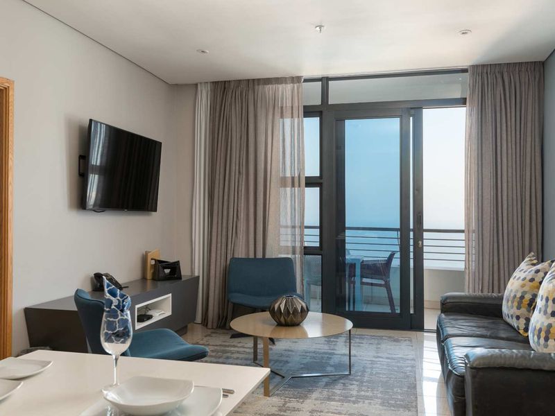 Where skyline views, modern luxury, and amenities seamlessly merge. - Photo 2