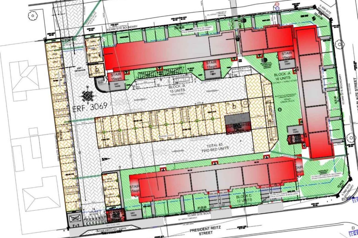 Architectural site plan showing the layout of three apartment blocks, parking areas, and site boundaries for the property development.