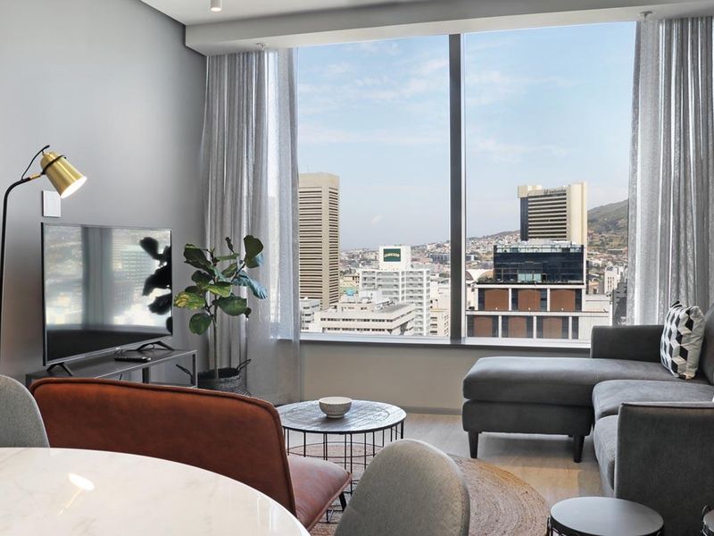 Experience City Living with a Serene Mountain Backdrop - Photo 5