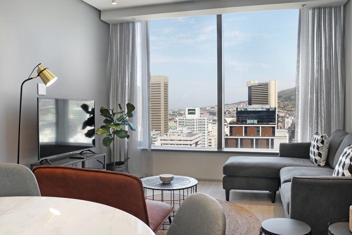 Experience City Living with a Serene Mountain Backdrop - Photo 5