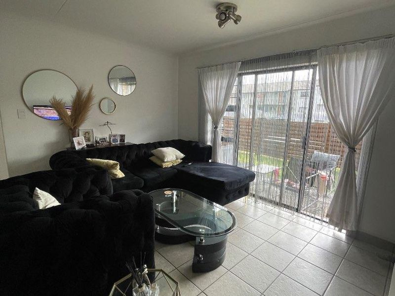 Bright & Airy 4-Bedroom Unit with Secure Access Control - Photo 8