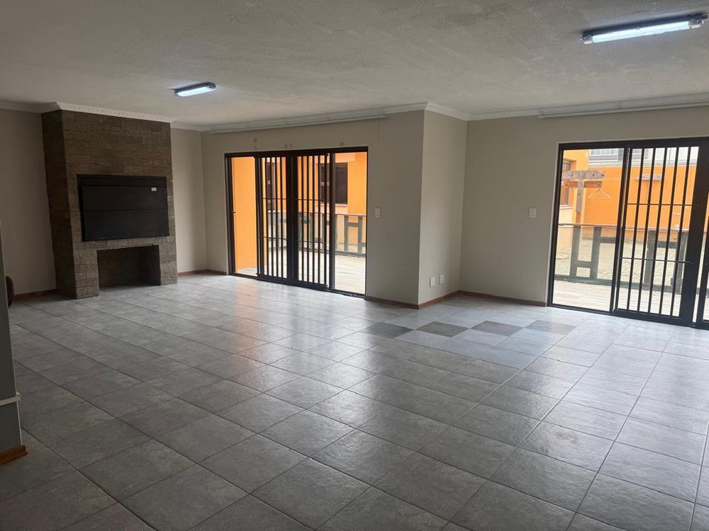 View of open plan dining area with indoor bbq