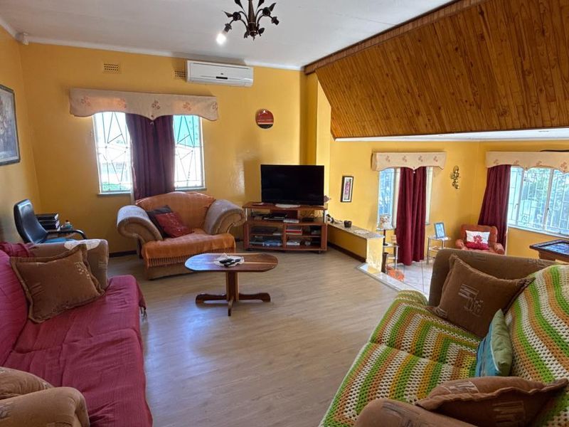 Set high above street level on a massive erf with a large front garden and elevated views - Photo 7