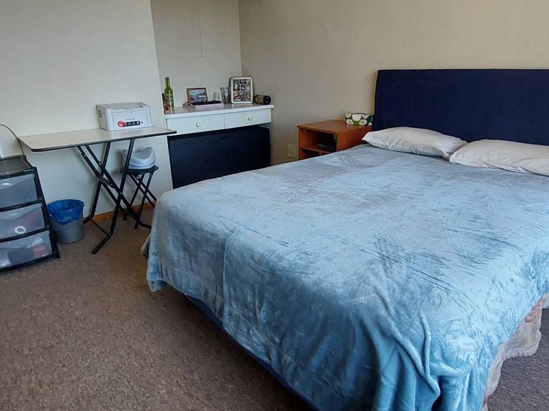 Secure Living: 2 Beds, Balcony, Carport & Storage Galore - Photo 9