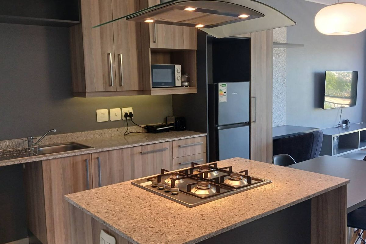 Modern and Stylish Apartment in Prime Location - Photo 2