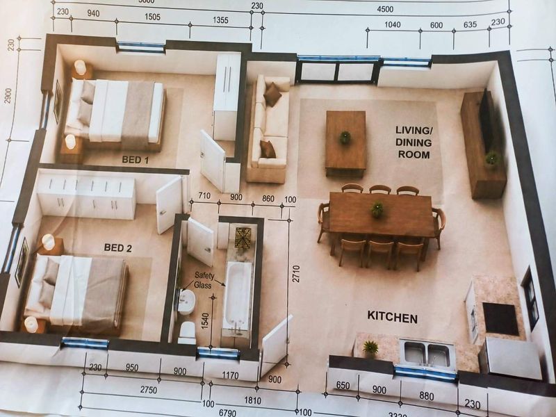 A detailed architectural floor plan showing the layout of a two-bedroom apartment with an open-plan kitchen, living, and dining area.