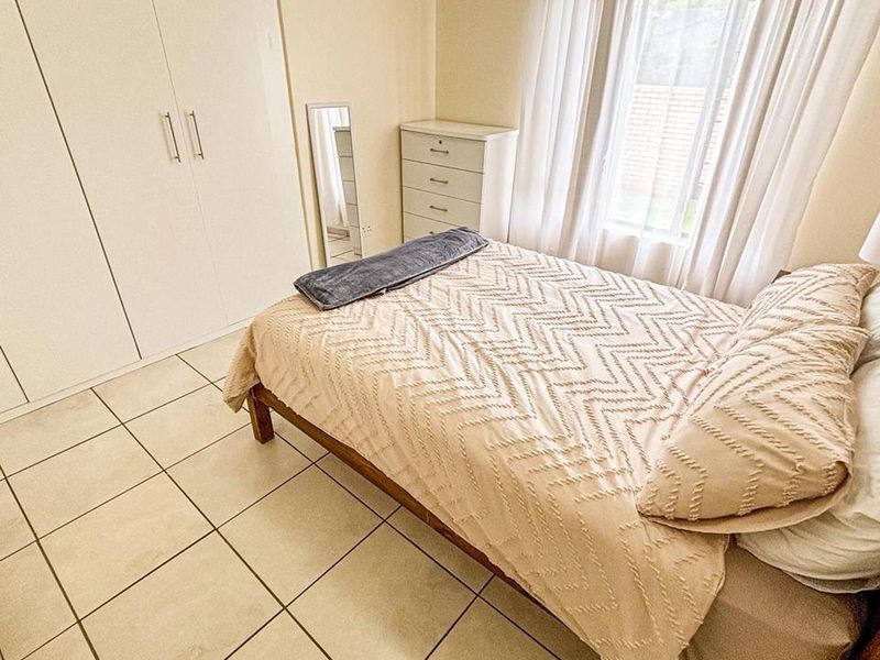 Modern Living: Spacious 2-Bed, 2-Bath Ground Floor Unit Awaits - Photo 9