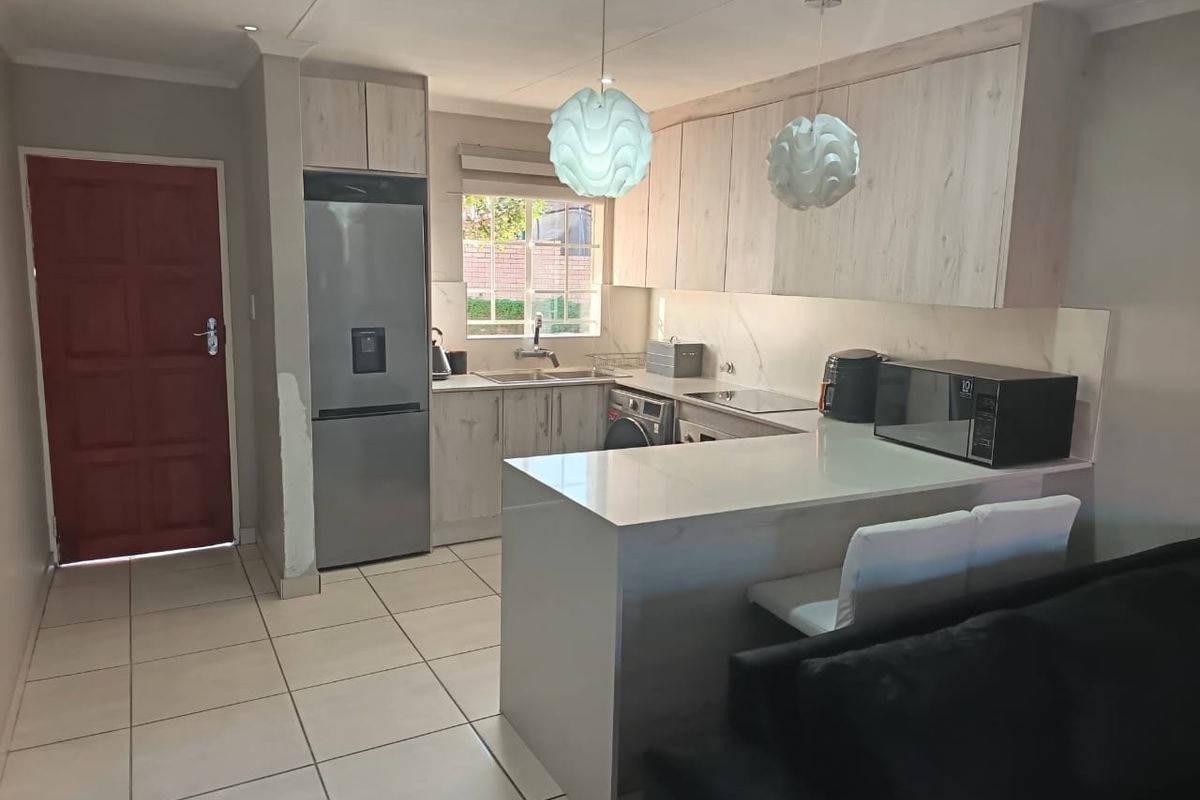 Rare find, Completely Redone 2-Bedroom townhouse with Private Garden in Security Complex. Exclusively Marketed by Sashen Moodley. - Photo 2