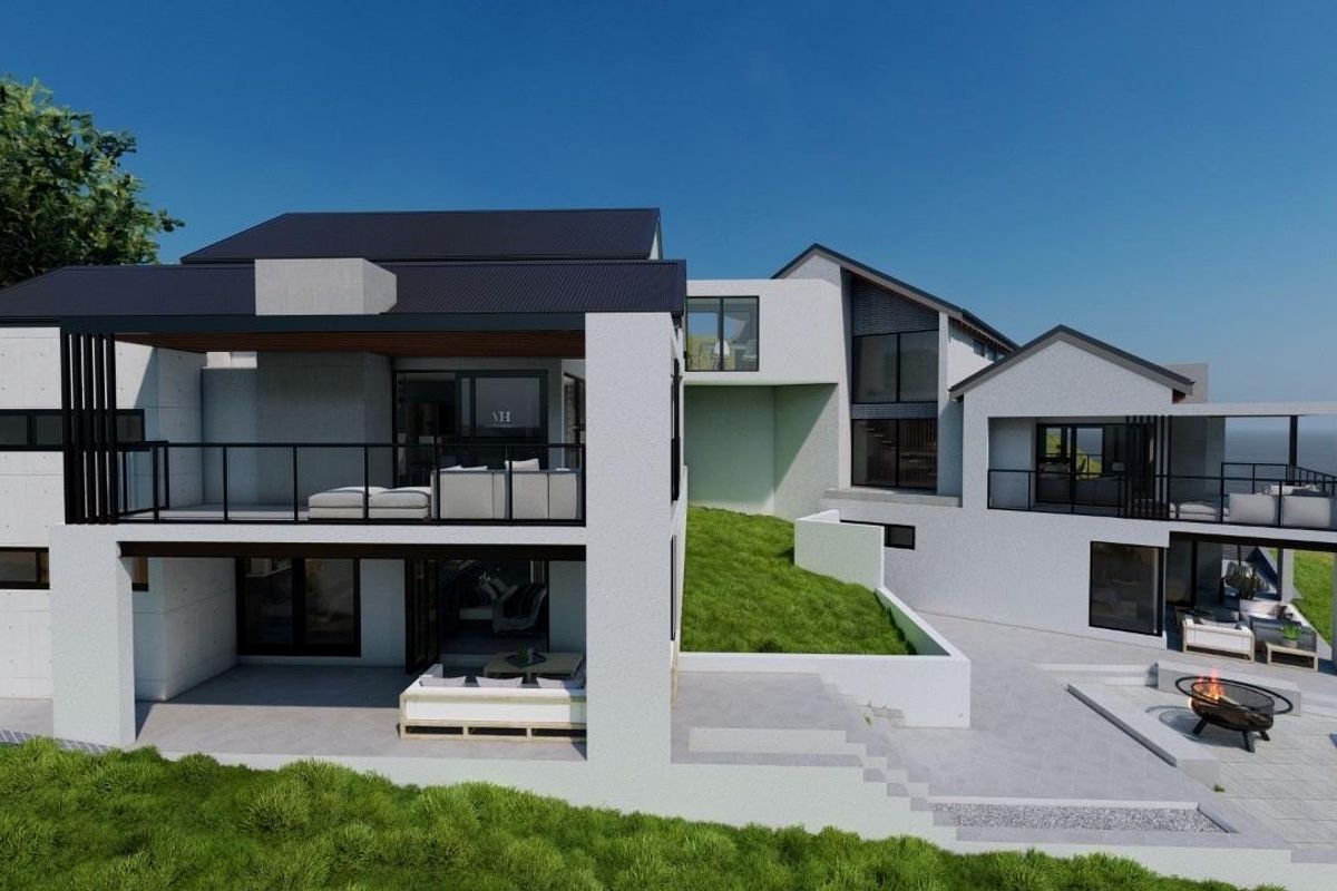 A modern architectural rear elevation featuring multi-level balconies, expansive glass doors, and a landscaped terrace overlooking the ocean.