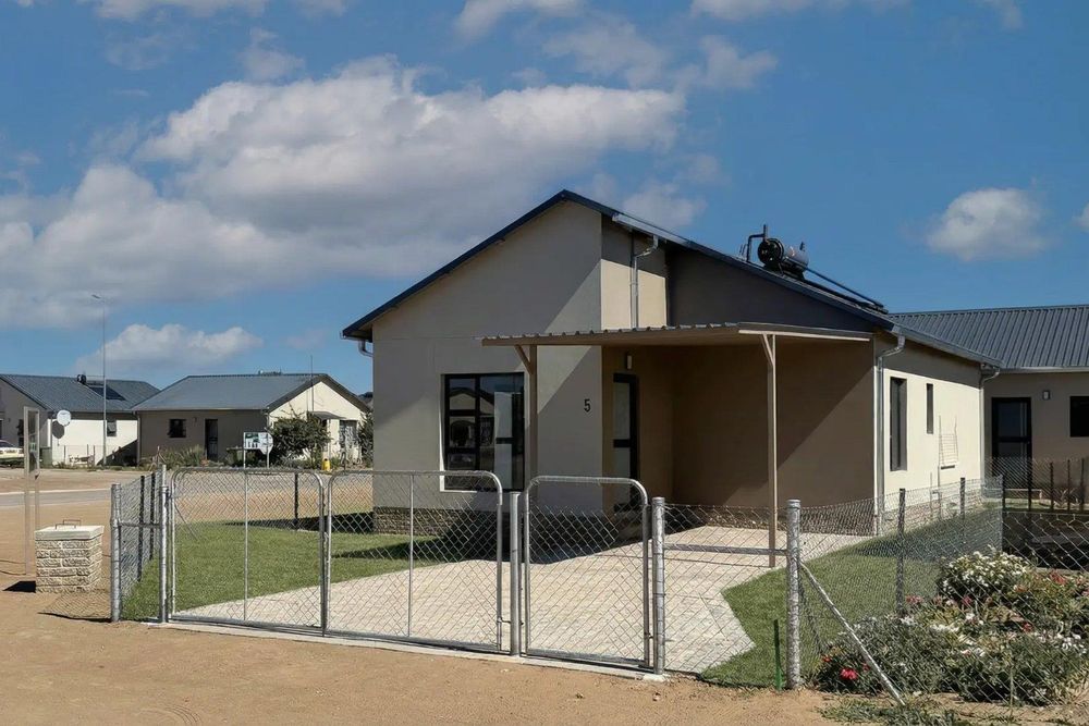 3-Bedroom freestanding townhouse with carport and provision for future expansion.