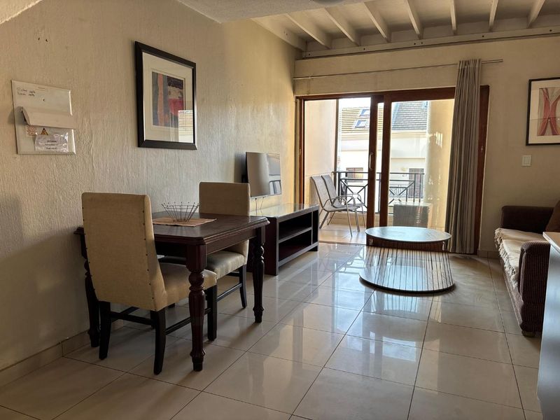 A STUNNING ONE BEDROOM FURNISHED DUPLEX - Photo 3