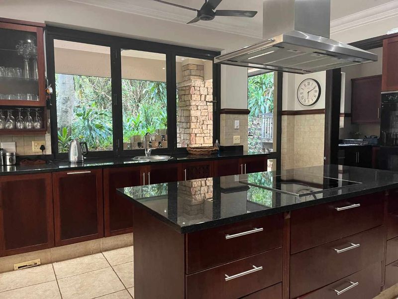 A home offering an exceptional blend of luxury, comfort, & nature, making it the perfect place to call home. - Photo 7