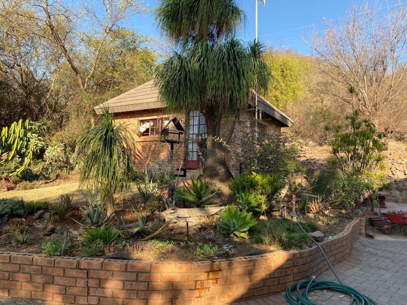 Expansive Property with Main House & Income-Generating Second Property - Photo 3