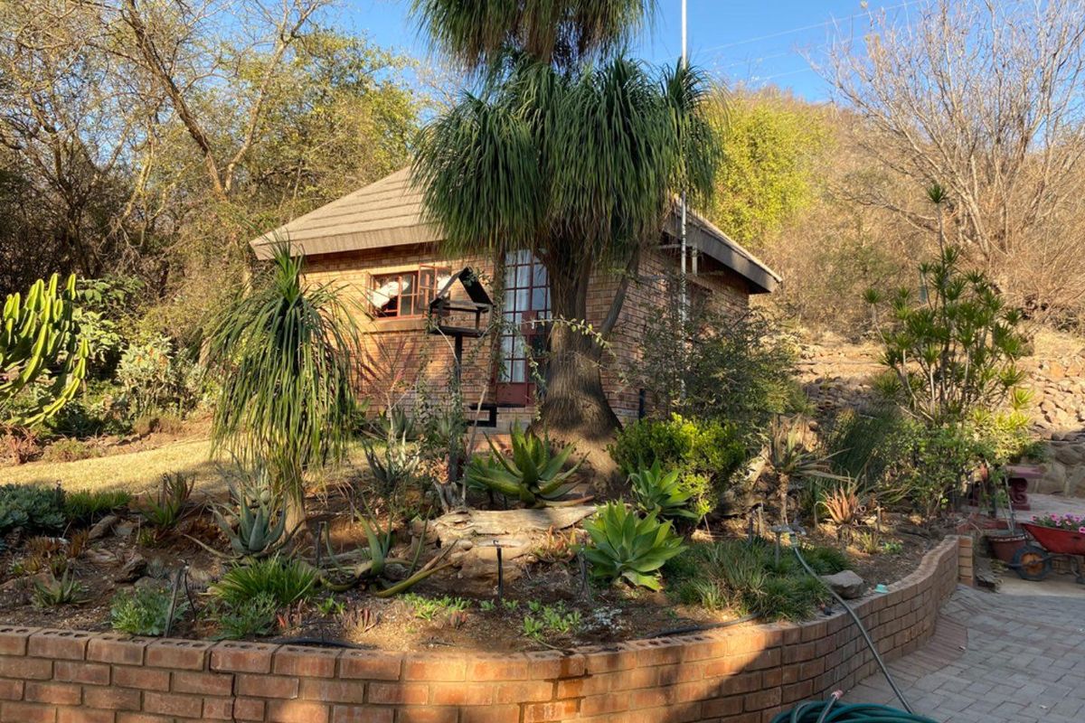 Expansive Property with Main House & Income-Generating Second Property - Photo 3