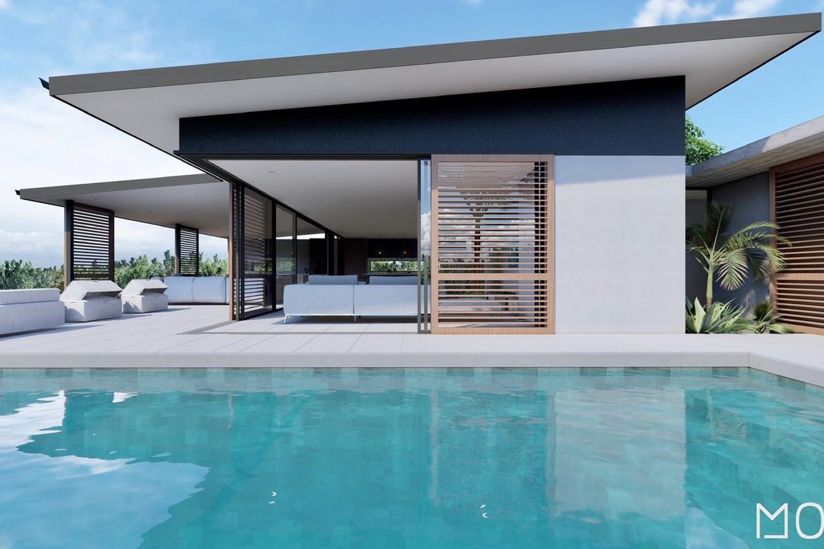 Modern architectural design featuring a swimming pool, expansive tiled patio, and seamless indoor-outdoor flow through large sliding glass doors.
