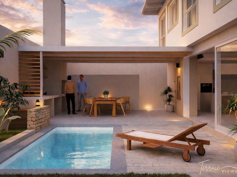 A modern outdoor entertainment area featuring a swimming pool, covered patio with built-in braai, and seamless indoor-outdoor flow through large sliding glass doors.