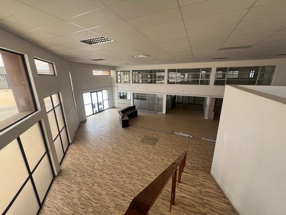 Main entrance reception area, offices and upstairs entertainment area