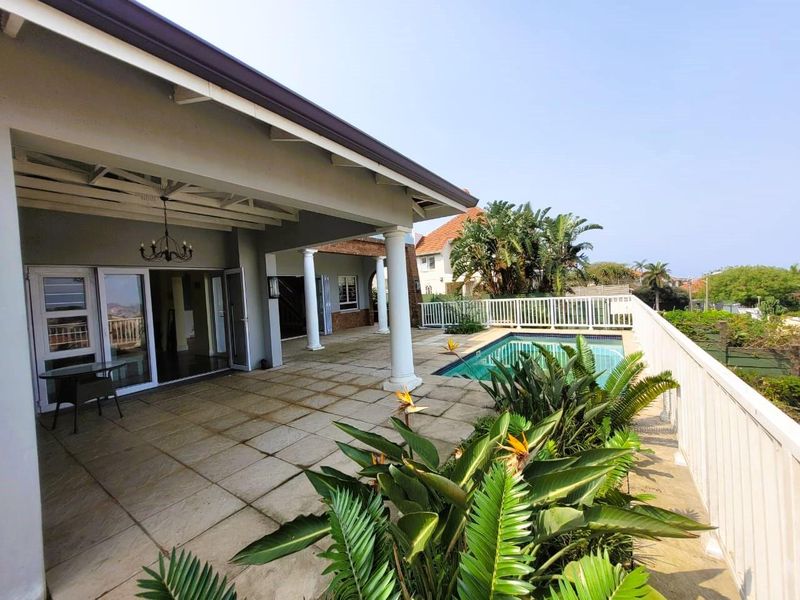 Luxurious 3-Bedroom Home with Panoramic Sea & City Views in Morningside - Photo 4