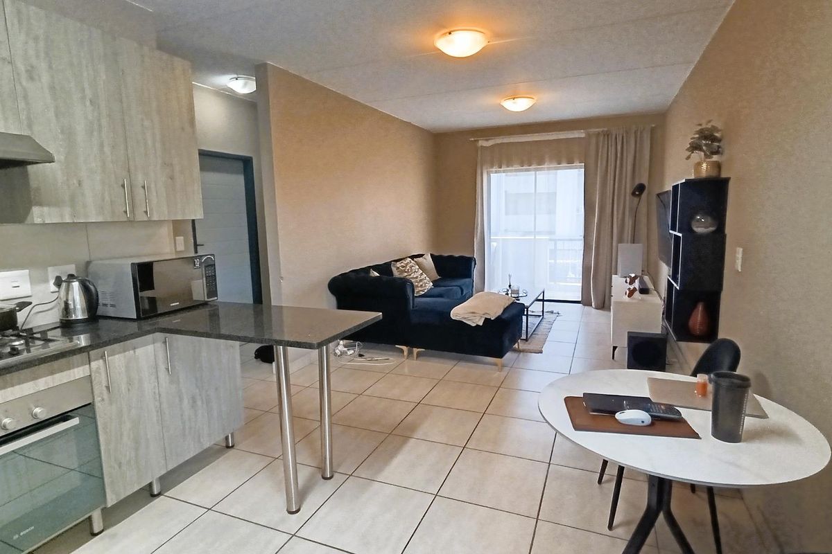 Unlock the Door to your First Home: Stylish and Secure 2 Bedroom Apartment - Photo 3