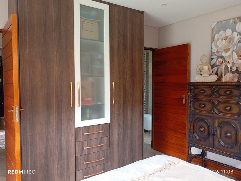 Elegant Family Living in Secure Glen Eagle Estate - Photo 5