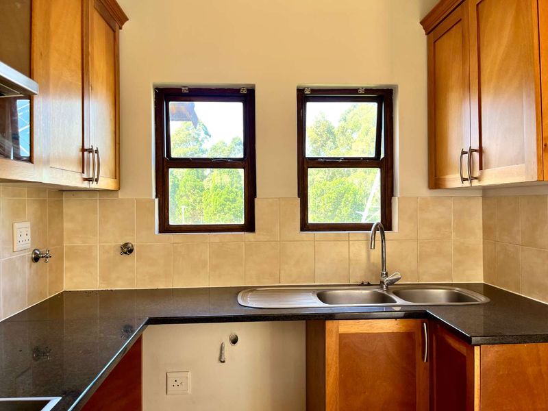 Charming 2-Bed Townhouse in Sought-After Plantations Estate - Photo 3