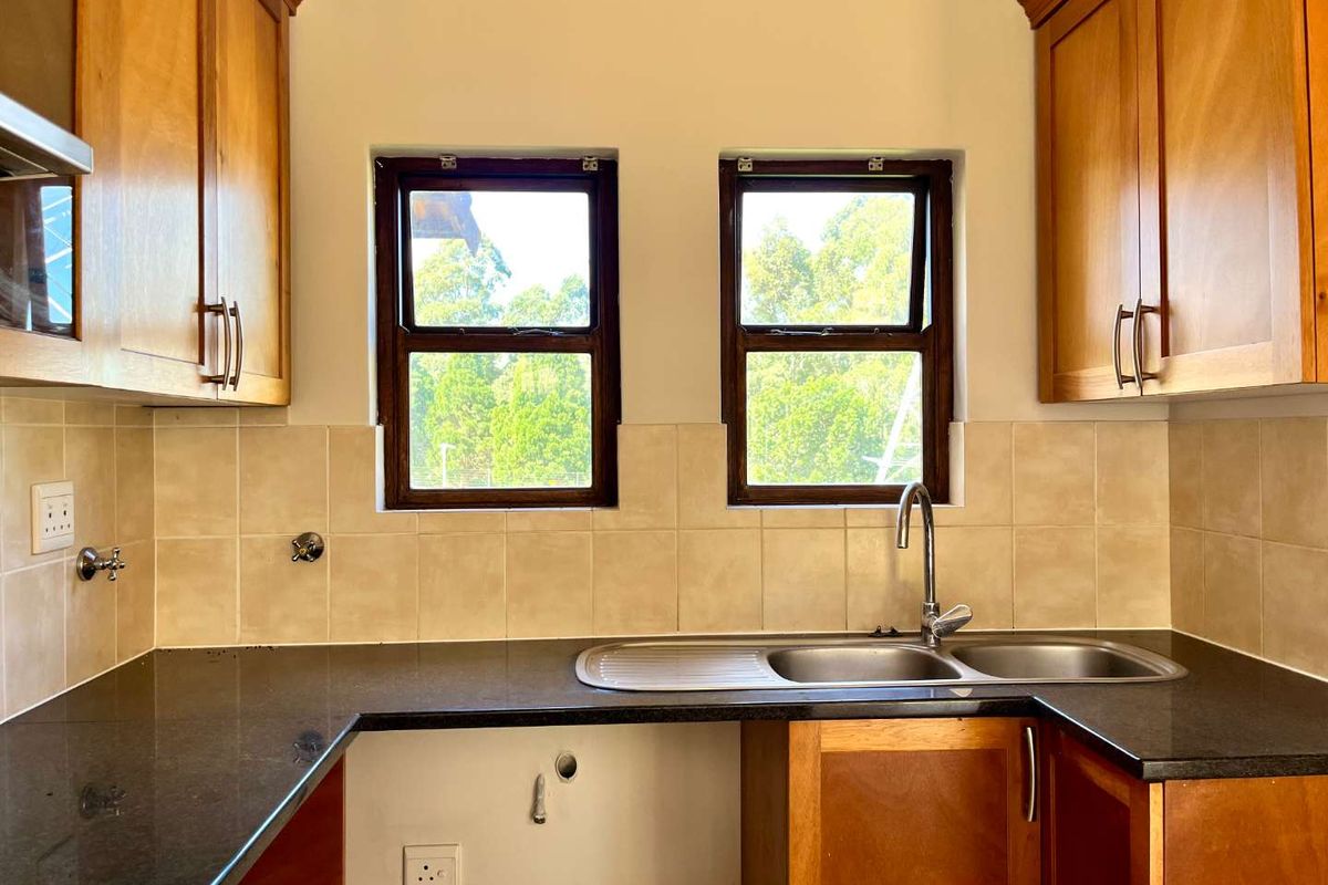 Charming 2-Bed Townhouse in Sought-After Plantations Estate - Photo 3