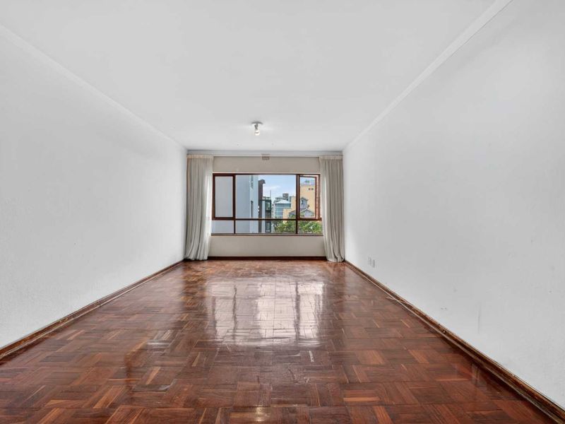 BEACHFRONT LIVING IN THE HEART OF SEA POINT - Photo 3