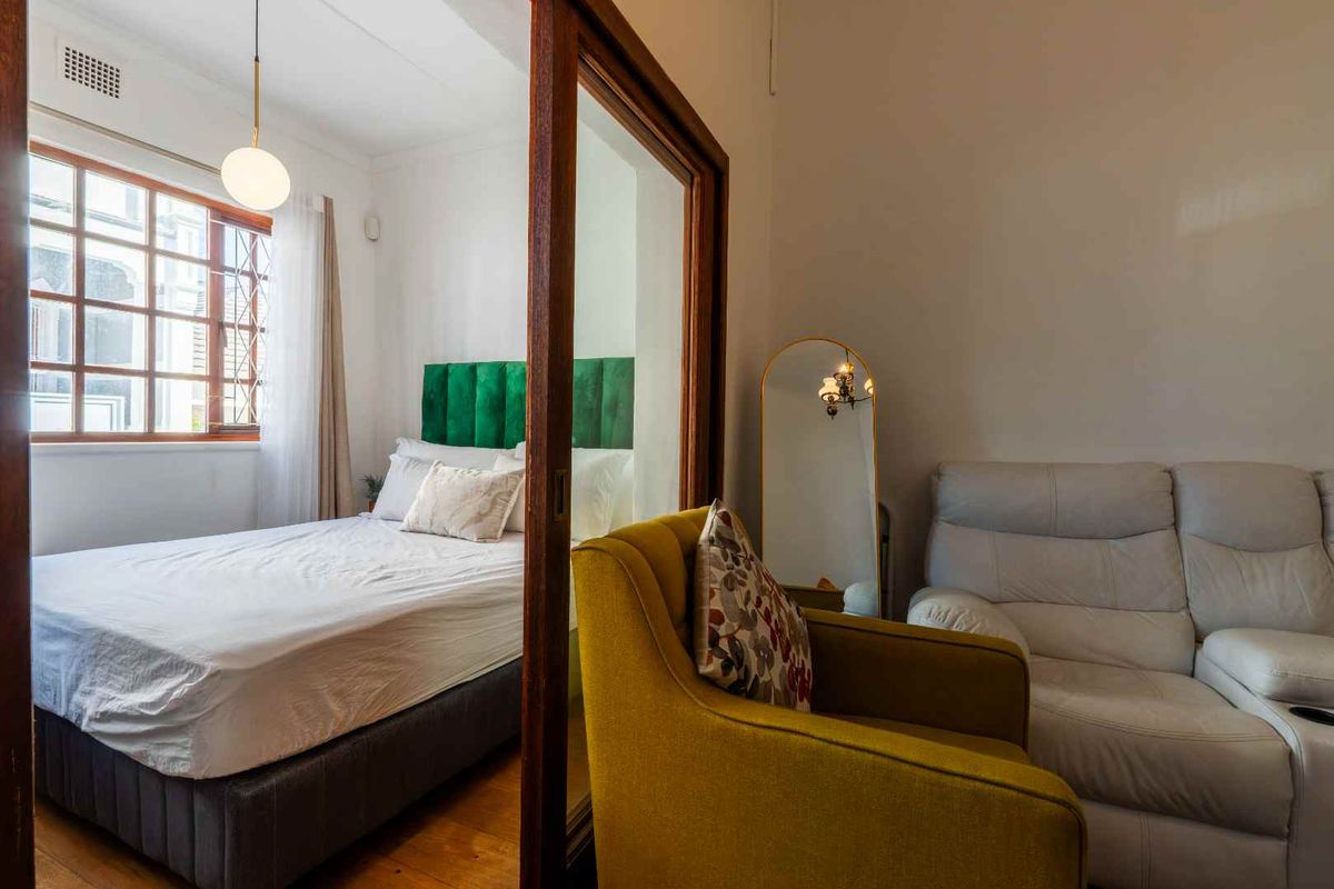 Charming 2-Bedroom Home with Rooftop Entertainment Area in the Heart of Sea Point - Photo 4