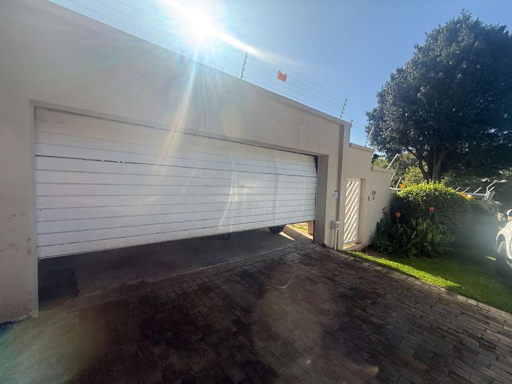 Automated garage door at main house