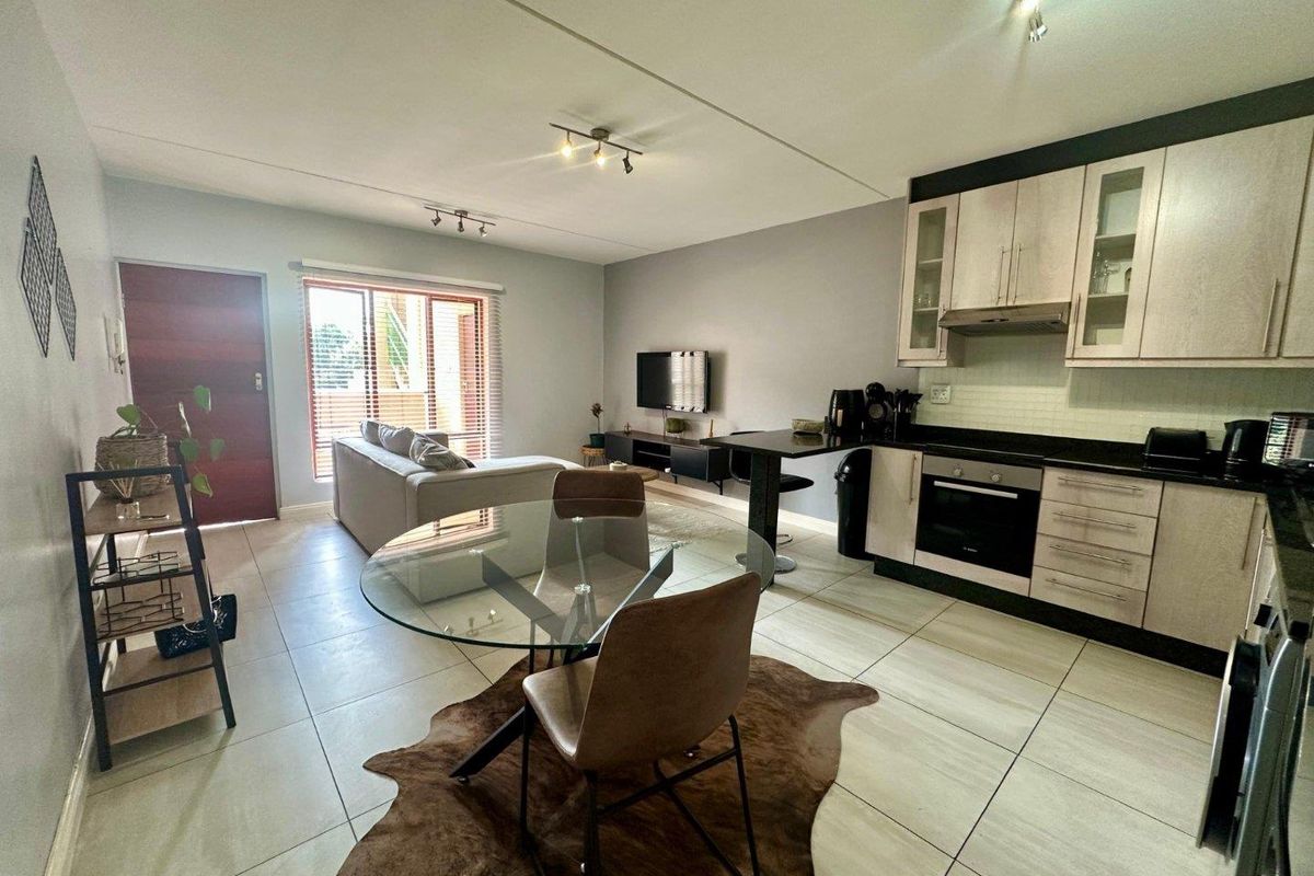 A MODERN ONE BEDROOM FURNISHED APARTMENT - Photo 4