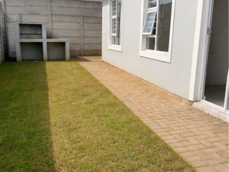 Safe & Spacious 3-Bedroom Home with Yard – Move-In Ready in "GREENWOOD GARDENS" Estate Alliance - Photo 5