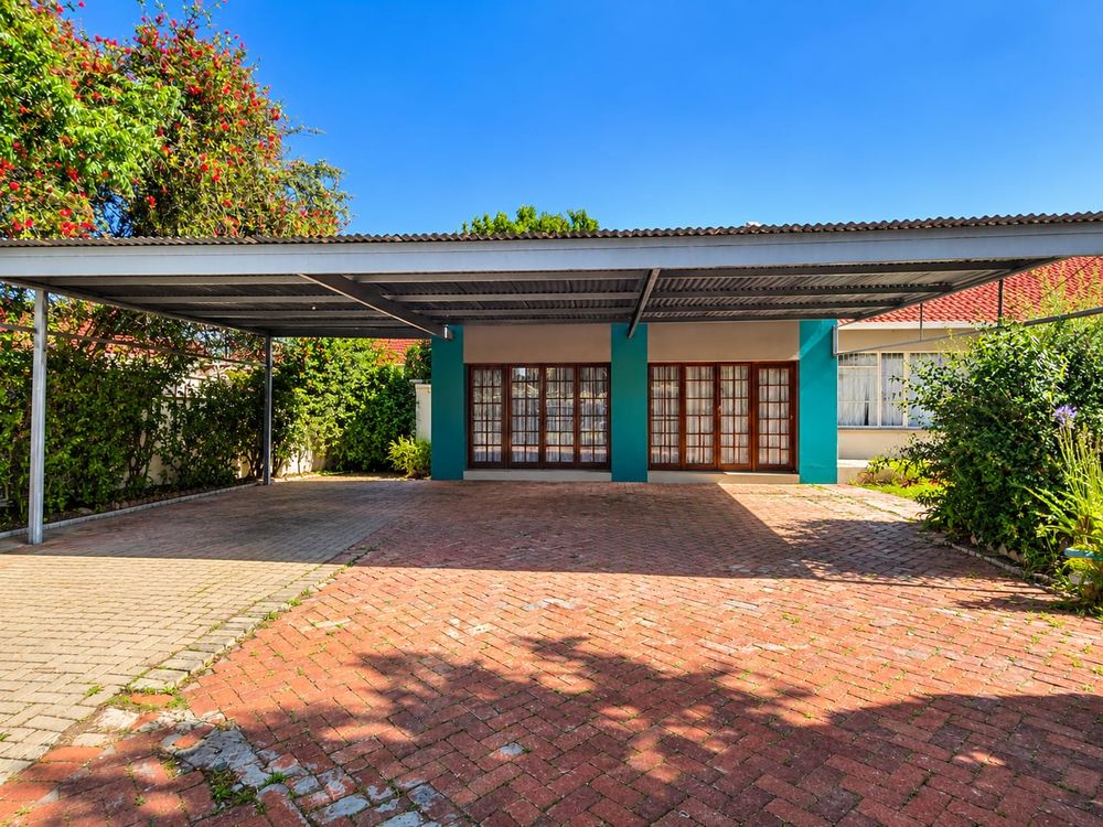 Two Bachelors rented out and a carport for 3 cars