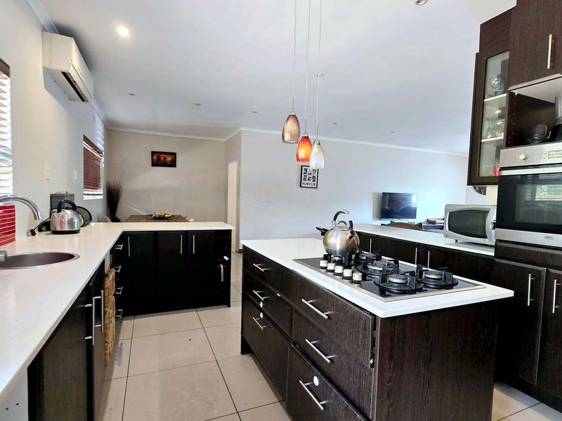 Spacious Family Living Meets Modern Off-Grid Convenience in Meyerspark - Photo 5