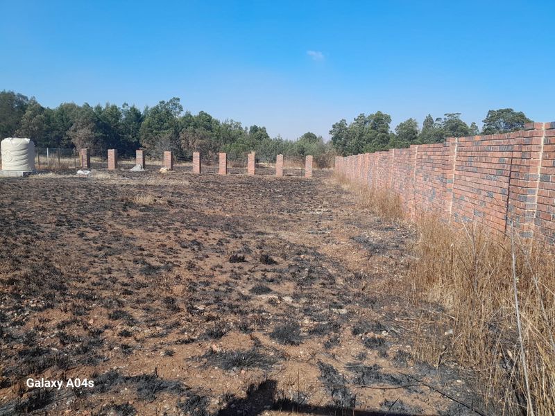 Walled Vacant Stand Inside Boomed Area With a Borehole Dug - Photo 3