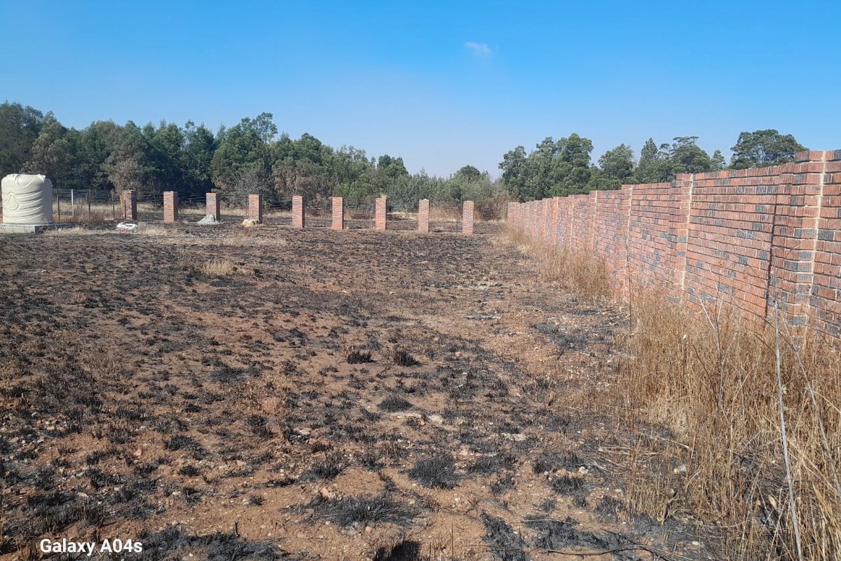 Walled Vacant Stand Inside Boomed Area With a Borehole Dug - Photo 3