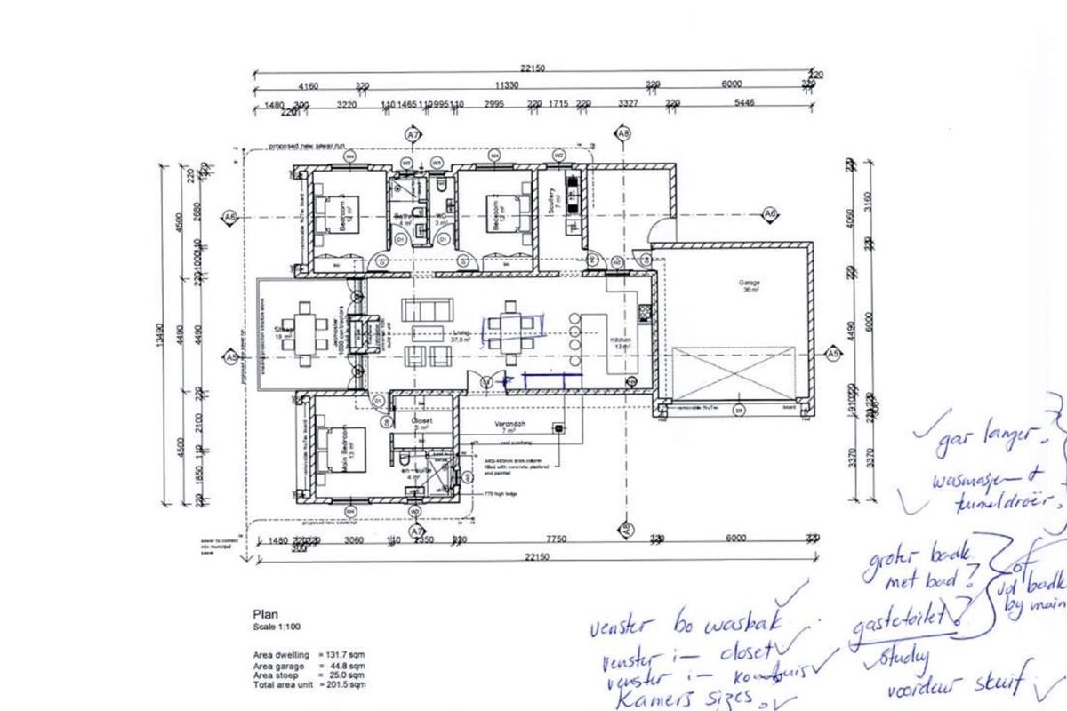 Architectural floor plan for a residential property showing the layout of bedrooms, living areas, kitchen, garage, and veranda with handwritten notes.