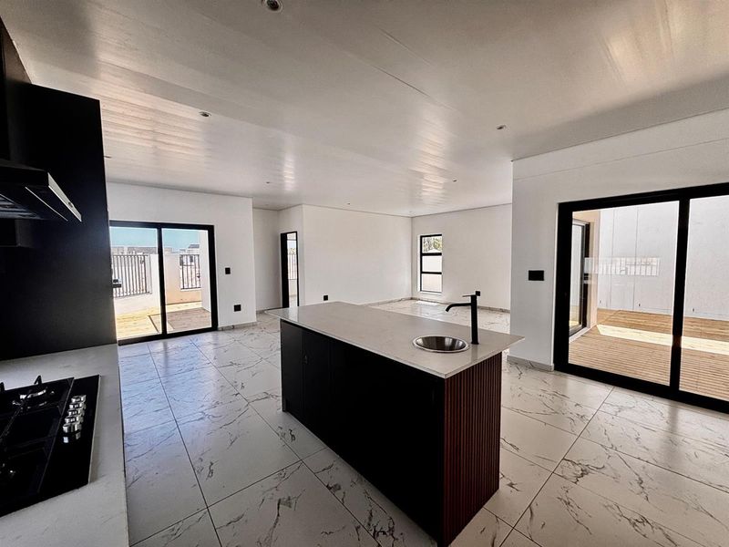 Near Off-Grid Designer Home | Elevated Luxury Living in Sandown, Blouberg - Photo 5