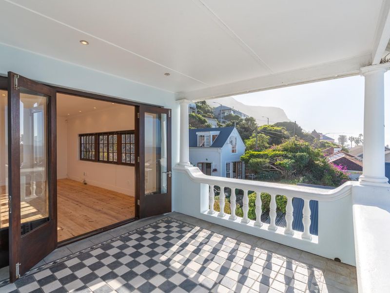 Elevated Coastal Charm with Unmatched False Bay Views for Rent Long Term - Photo 2