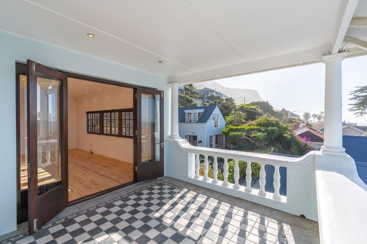 Elevated Coastal Charm with Unmatched False Bay Views for Rent Long Term - Photo 2