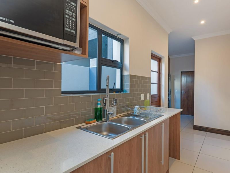 Elegant Family Living in the Heart of Sagewood - Photo 8