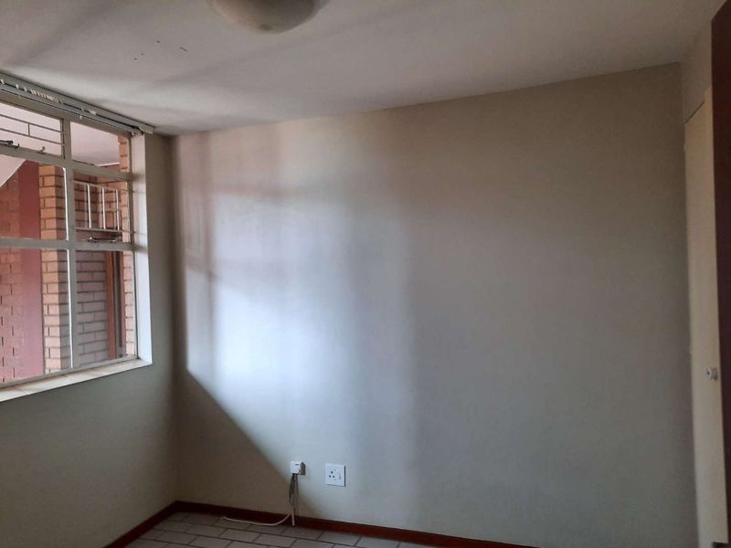 Enjoy Comfort & Security in This Neat 2-Bed Apartment - Photo 9