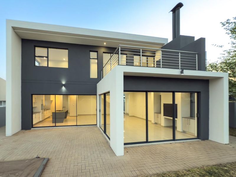 Modern Architectural Gem with Versatile Living & Expansive Balcony in Midstream Meadows - Photo 5