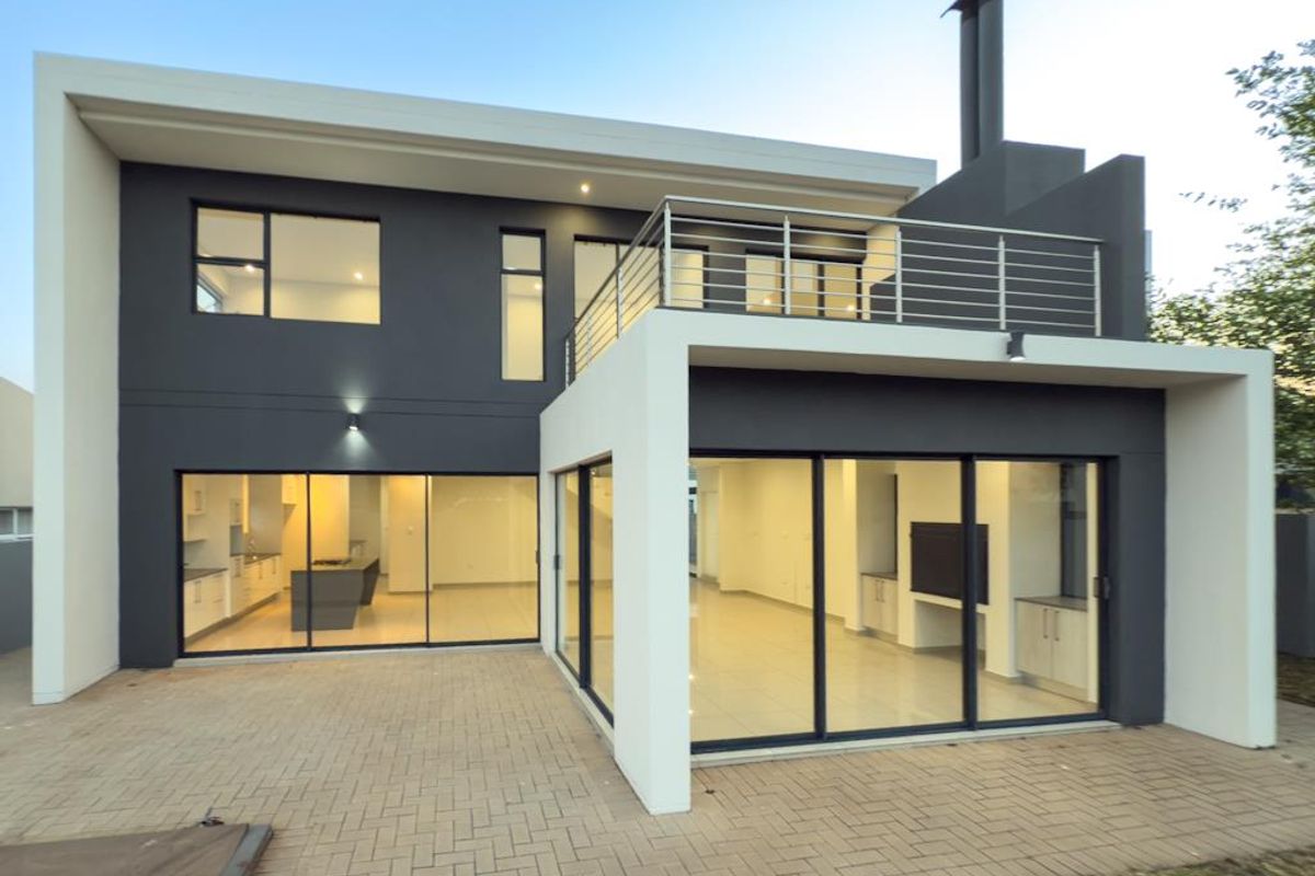 Modern Architectural Gem with Versatile Living & Expansive Balcony in Midstream Meadows - Photo 5