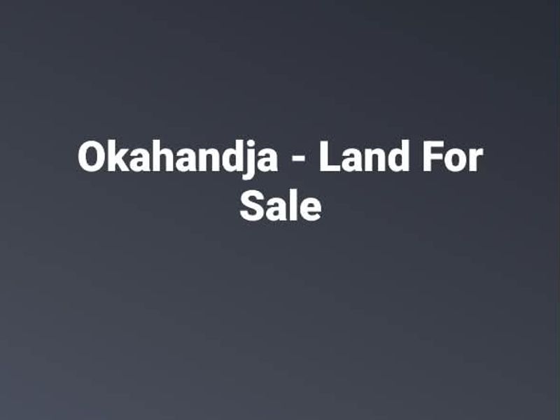 A digital screenshot of a property listing advertisement for vacant land in Okahandja.