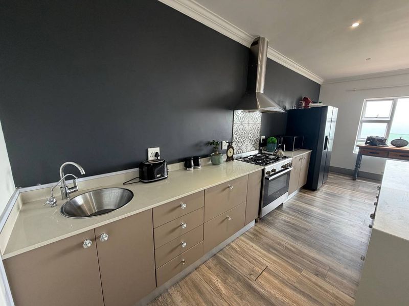 Modern Single-Level Cladded Brick Home with Ocean views - Photo 9